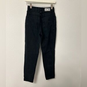 Black denim jeans with a straight leg fit and 5 pocket design #90s